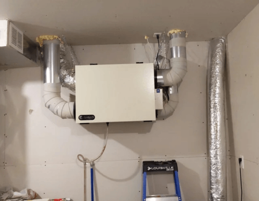 Échangeur d'air HRV installé mur — Rive-Nord JMR